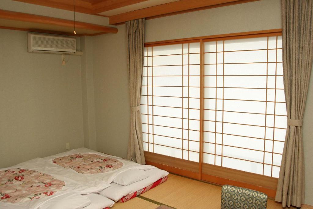 Hotel Yuou Onsen Kōfu Rum bild